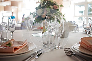 Wedding decor. Flowers in the restaurant, table setting