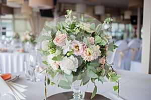 Wedding decor. Flowers in the restaurant, table setting