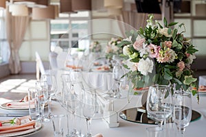 Wedding decor. Flowers in the restaurant, table setting