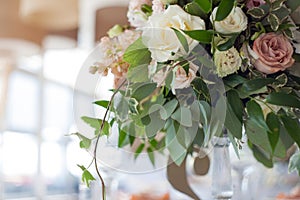 Wedding decor. Flowers in the restaurant, table setting