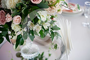 Wedding decor. Flowers in the restaurant, table setting