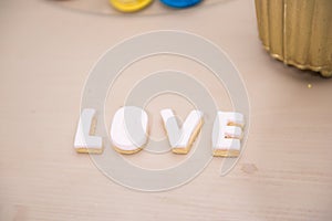 Wedding decor, LOVE letters on table. LOVE decoration on festive table. Luxurious wedding decoration on restaurant table