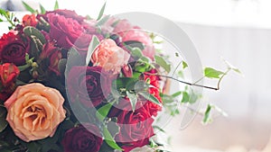 Wedding decor. Red Flowers in the restaurant, soft picture