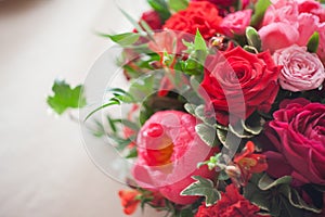 Wedding decor. Red Flowers in the restaurant, table setting