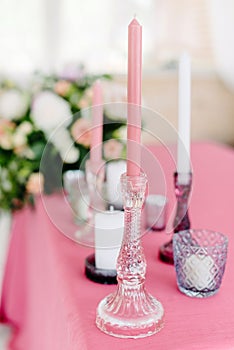 Wedding decor. Table for the newlyweds outdoor. Wedding reception. Elegant table arrangement, floral decoration, restaurant