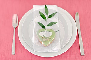 Wedding decor. Table for the newlyweds outdoor. Wedding reception. Elegant table arrangement, floral decoration, restaurant