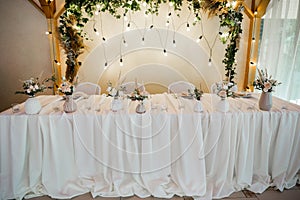 Wedding decor on the table in the restaurant