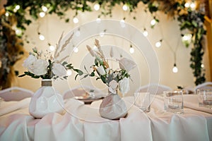 Wedding decor on the table in the restaurant