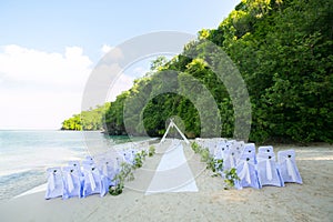 Wedding decorated detail on beach.