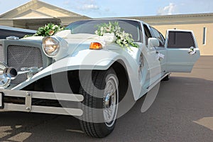 Wedding decoration on a limousine