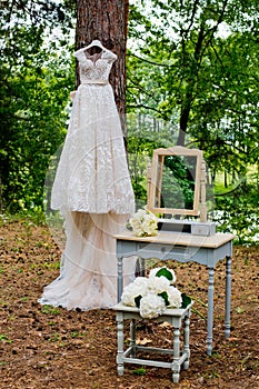 Wedding decorations in rustic style. Wedding at nature in the forest