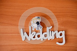 Wedding decorations. White wooden box for wedding rings with the inscription Wedding