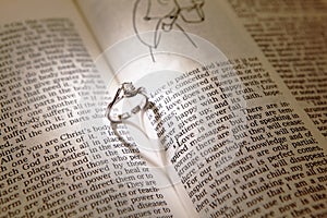 Wedding diamond rings on a bible