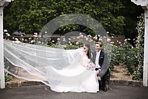 Wedding dress caught by the wind photo