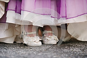 Wedding dress with purple. accent close.