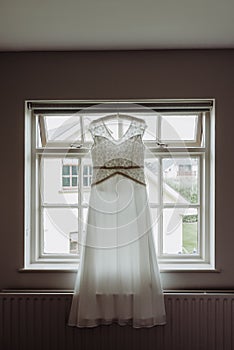 Wedding dress on the window