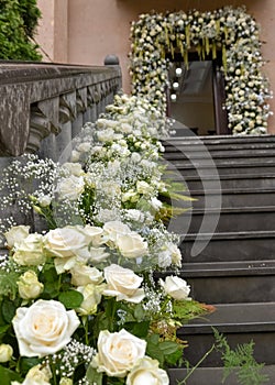 wedding exterior at the bride\'s house with flower decoration