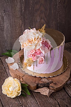 Wedding, birthday cake with pink peony. photo