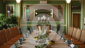 Wedding festive table with decor and flowers in the restaurant