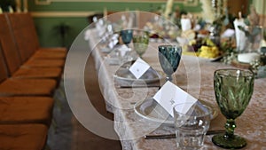 Wedding festive table with decor and flowers in the restaurant