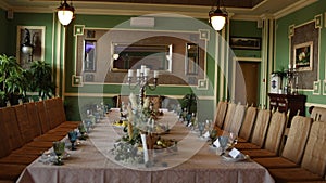 Wedding festive table with decor and flowers in the restaurant