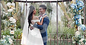 Wedding, first dance and black couple in garden with love, celebration and excited for future together. Gazebo, man and