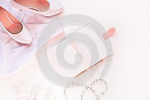 Wedding flat lay, womans stylish fashion accessories in biege colors, white background,copy space.Bridal details concept