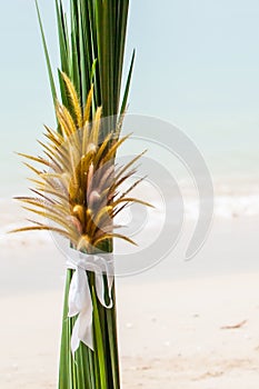 Wedding floral decorations on the beach in Thailand.