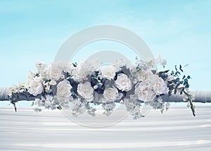 Wedding floral decorations gentle white flowers over blue sky background