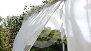 Wedding Flower Arch Decoration.Wedding arch decorated with flowers at the park