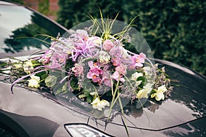 Wedding flowers bride car