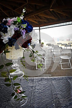 Wedding Flowers, chairs and tables at an Outdoor Wedding