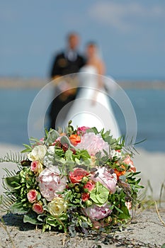 Wedding flowers and couple