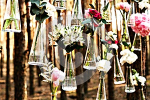 Wedding flowers decoration arch in the forest. The idea of a wedding flower decoration.