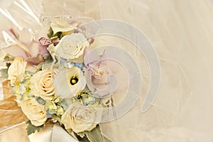 Wedding flowers and ivory bridal veil