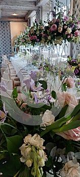 Wedding flowers on reception table.