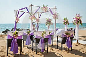 Wedding flowers setting on the beach.