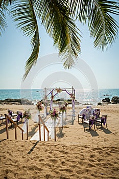 Wedding flowers setting on the beach.