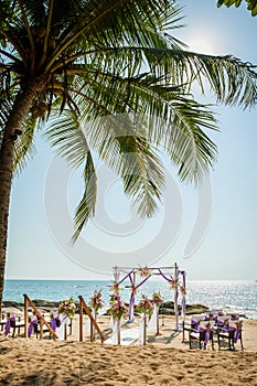 Wedding flowers setting on the beach.