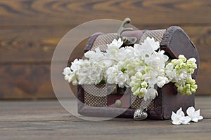 Wedding flowers in wooden vintage chest