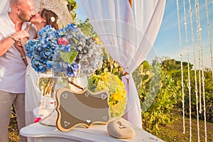 Wedding frame and honeymooners at background photo