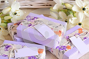 Wedding gifts details guest favors boxes soaps with purple white color decoration stripped paper floral fabric