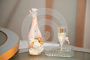 WEDDING GLASS AND BOTTLE OF CHAMPAGNE. WEDDING CEREMONY. Chilled champagne ready for a celebration