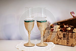 Wedding glasses decorated with cord, beautiful green ribbon on wedding glasses, handmade wedding glasses