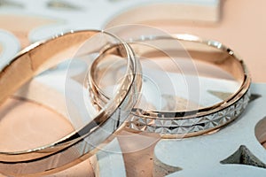 Wedding gold rings close up photo