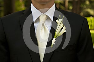 Wedding groom with corsage