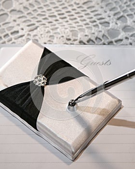 Wedding or guest book and pen
