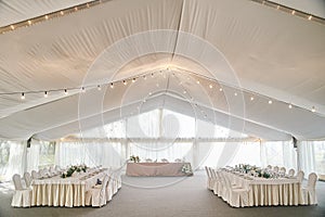 Wedding hall decoration in white colors. Wedding decorations