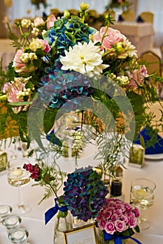 Wedding hall table flowers decoration detail