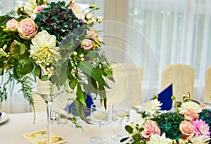 Wedding hall table flowers decoration detail